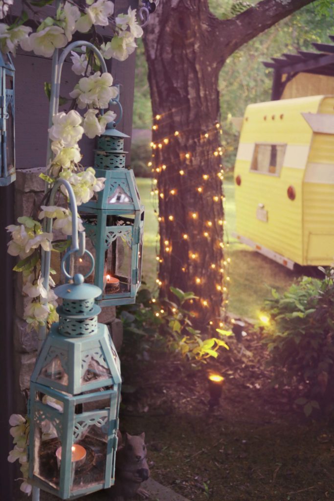 Glamping inspiration: Lanterns in the forest.