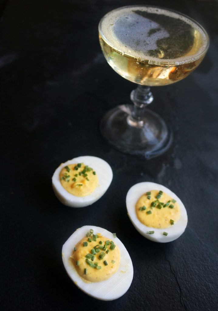 Recipe for champagne deviled eggs. Perfect for Easter, Ostara or spring festivities. 