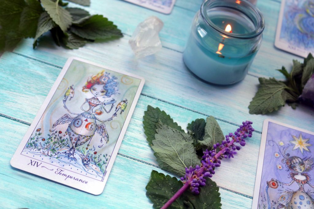 Let go of stress and anxiety with this easy tarot spread for beginners. with th