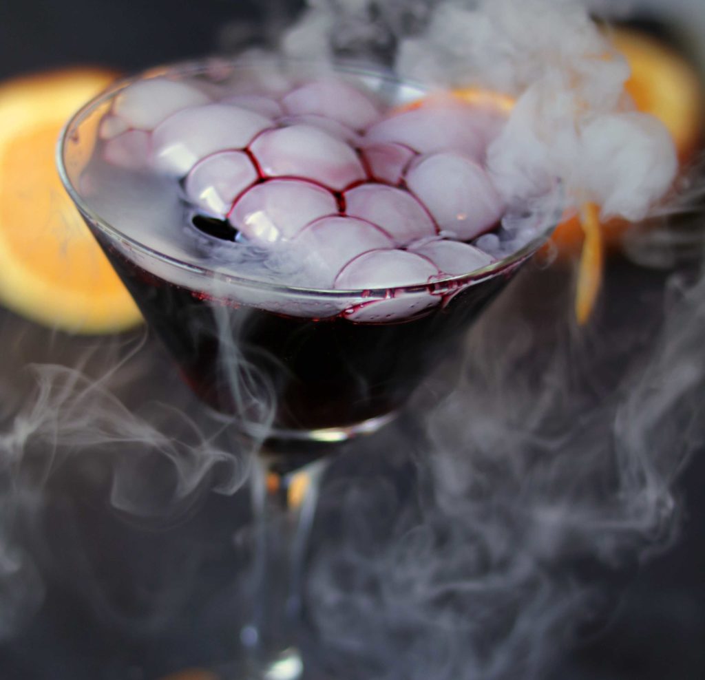 Samhain black magic martini. Perfect for a pagan dumb supper, Halloween or Samhain party.