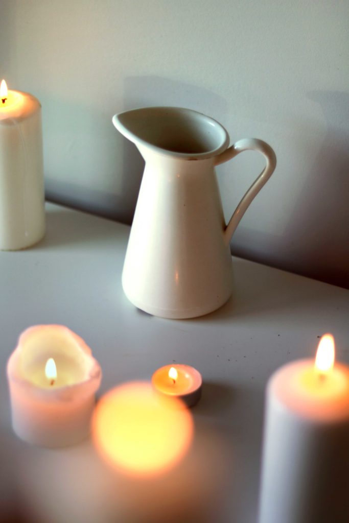 A french cream pitcher symbolizes milk on this Imbolc altar.