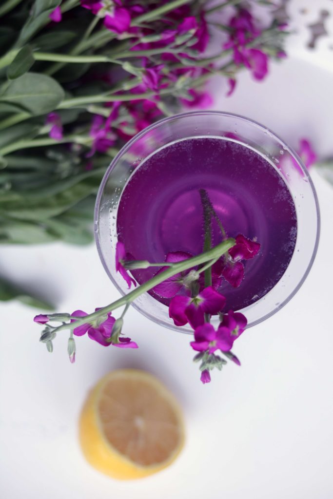 Gorgeous, creative, unique floral cocktail with natural, peaflower color.