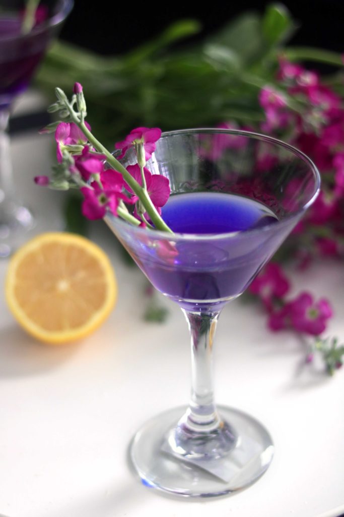 Purple fairy floral cocktail with natural peaflower color is perfect for Ostara, the spring equinox, Easter, a spring brunch or a bridal shower.