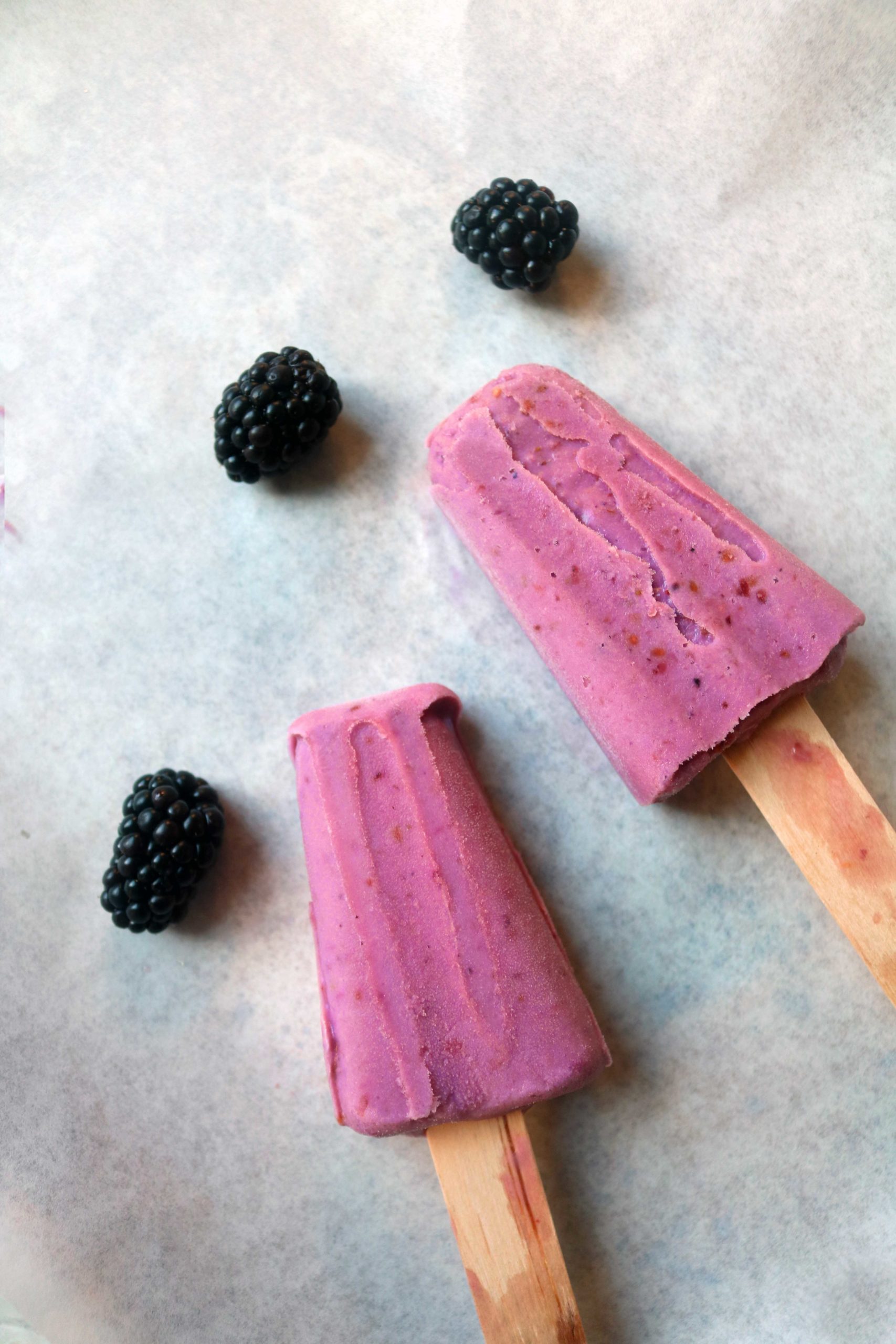 Blackberry moon milk popsicles with ashwagandha for an easy, creamy, cool summer treat to celebrate the full moon.