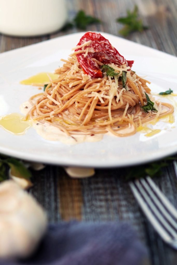 Herbal cream sauce with white wine and sundried tomatoes. 