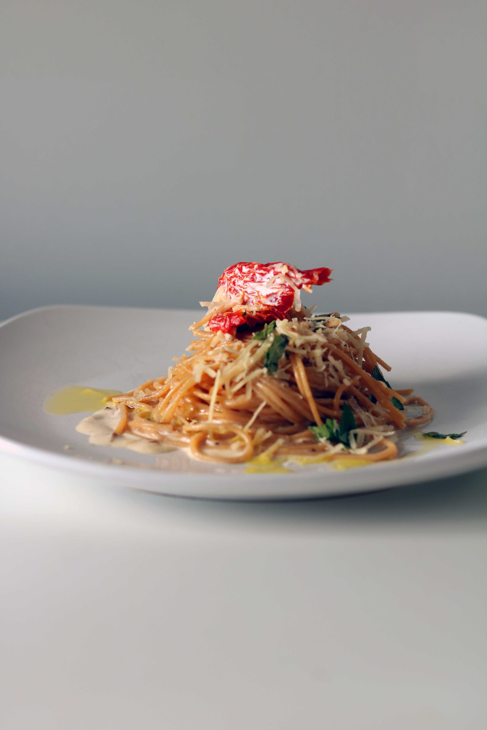 A kitchen witch's Imbolc recipe for winter herbal cream pasta with sundried tomatoes.