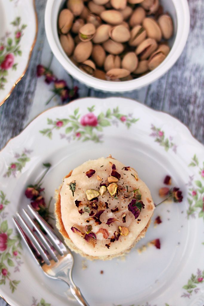 Ostara pistachio and lemon fairy cakes with rose buttercream frosting. 