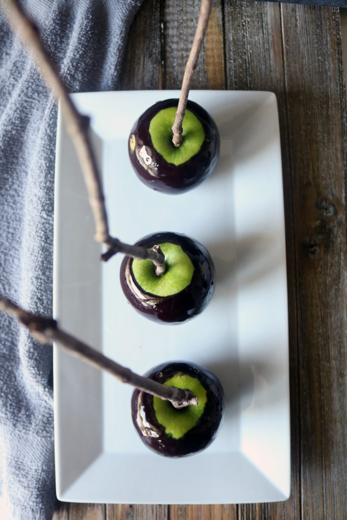 A kitchen witch's recipe for "poison" black magic candy apples.