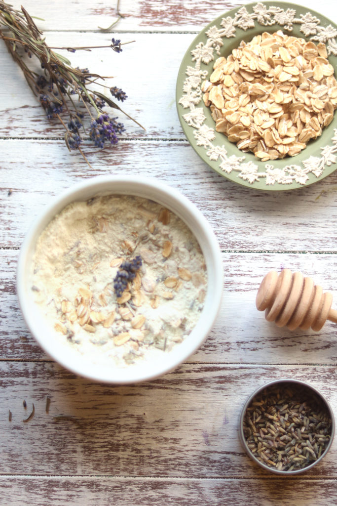 Ingredients for an oatmeal milk bath with lavender flower.