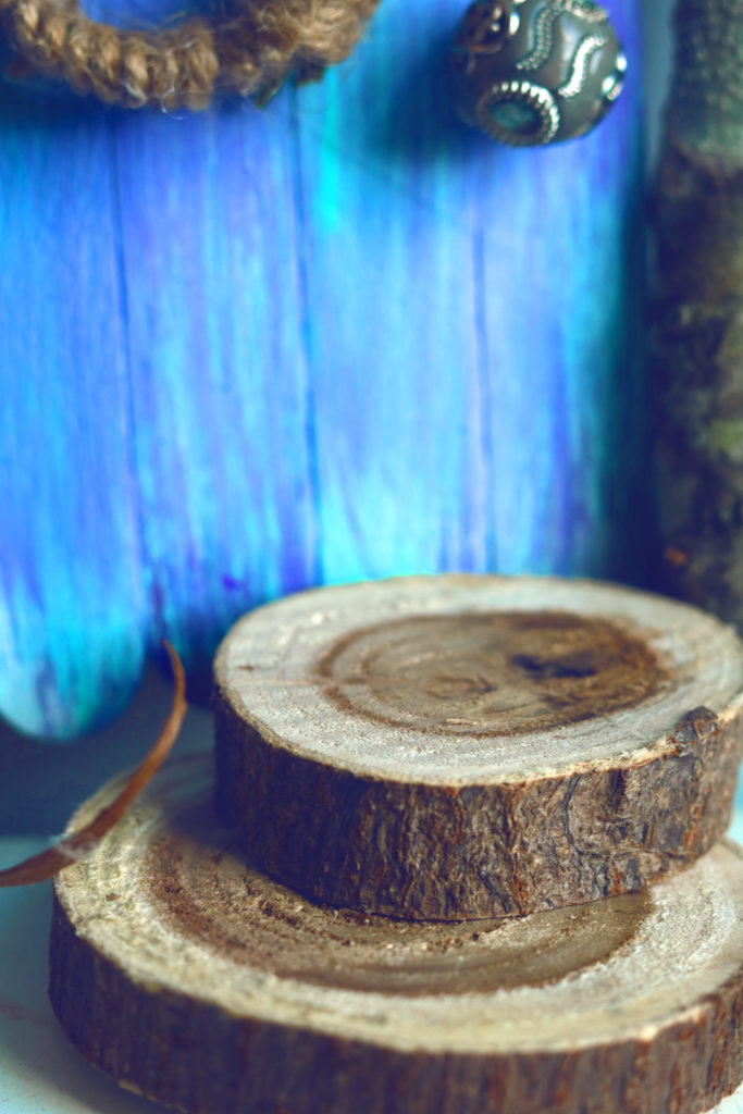 Steps leading to a handmade fairy door for a fairy garden or fairy dollhouse.