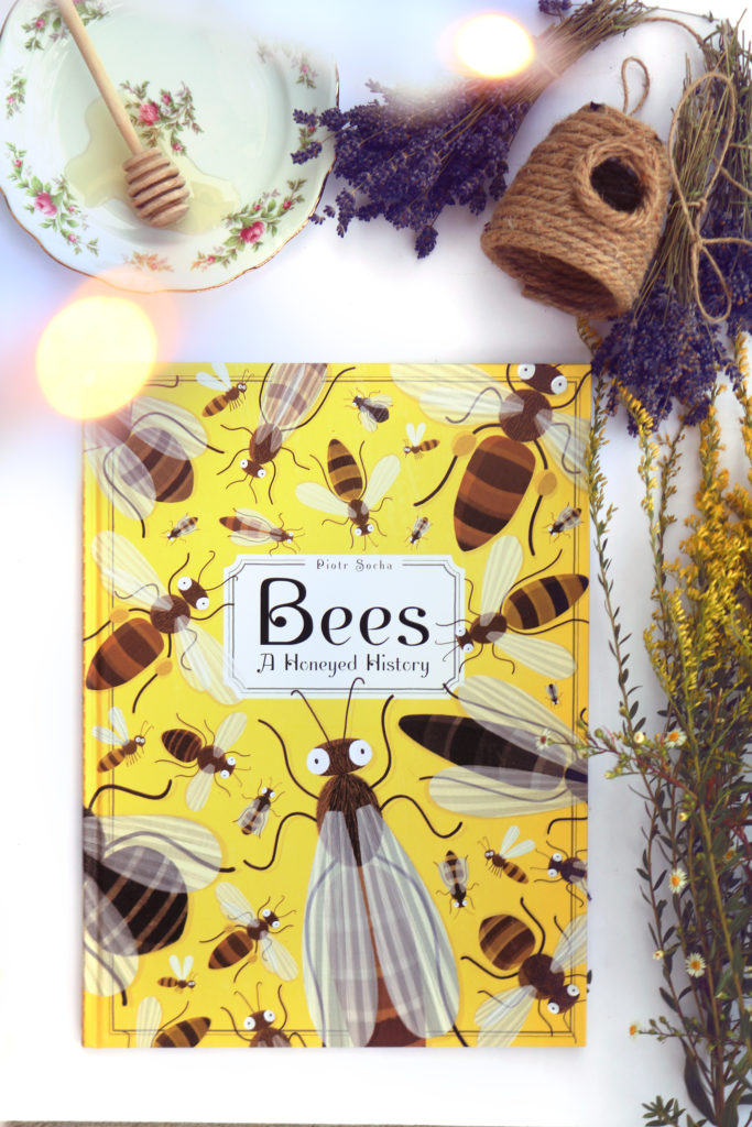 Bees: A Honeyed History by Piotr Socha is a beautiful child's book about the mythology, beekeeping and biology of bees for kids.