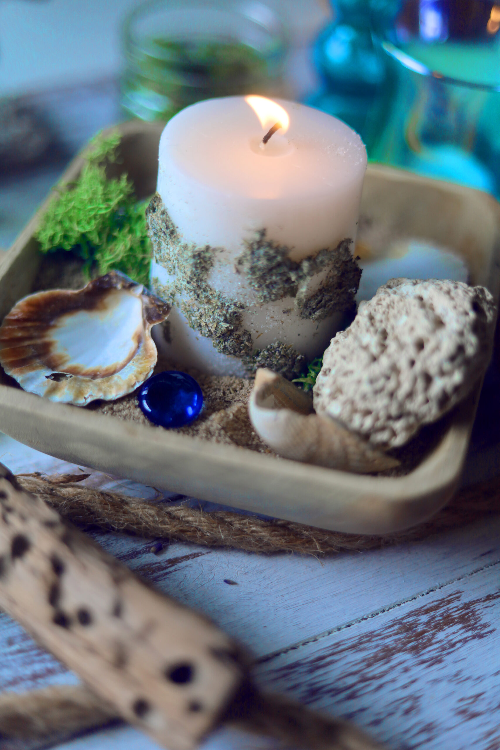 Easy DIY sacred candle for your sea witch altar or ocean magic spells. Perfect for water signs or ocean-dwelling witches!